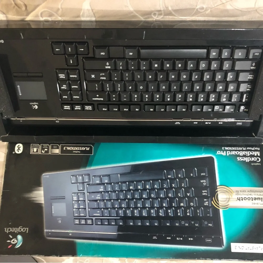 New arrival Logitech Cordless MediaBoard Pro PlayStation 3 Wireless Keyboard